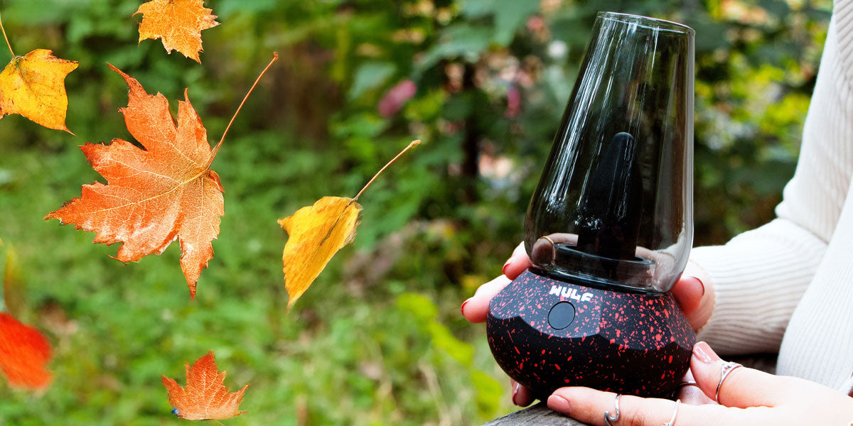 woman holding the Wulf Fang in outside fall weather